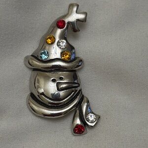 snowman brooch silver tone
multicolor rhinestones